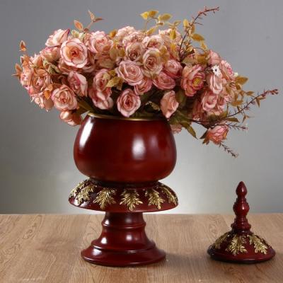 China Handwork Minimalist High Quality Home Decorative Resin Vase With Lid Storage Bottle Crafts for sale