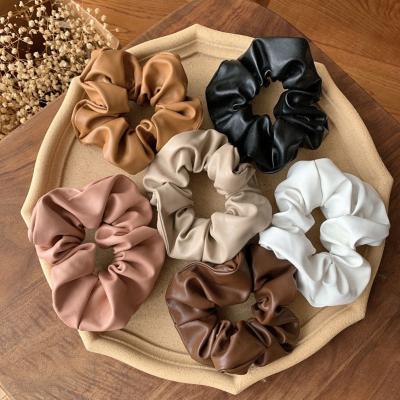 China Korean sexy large intestine hair leather ring, pure color, European and American rope style ball head high-end back main hair for sale