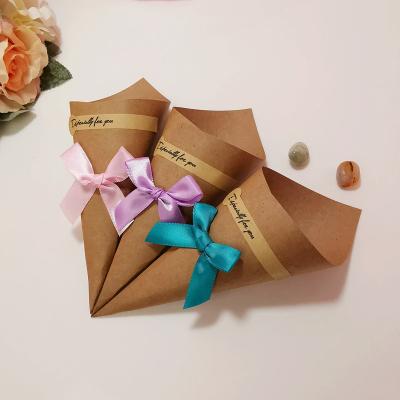 China Food Manufacturer Wholesale Kraft Paper Wedding Favors Candy Box Gift Packaging Bag With Ribbon for sale