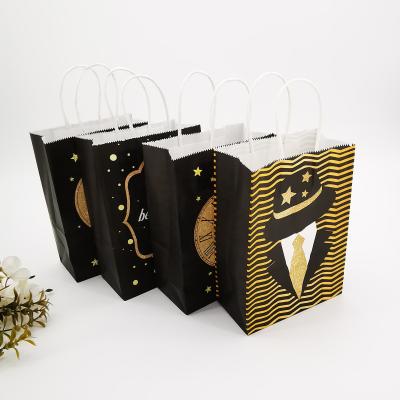 China Recyclable Eco-friendly Gift Wrapping Paper Gift Bag Wholesale Kraft Paper Handle Packaging Bag for sale