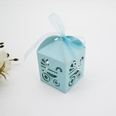 China 5*5*8cm Food Baby Shower Candy Box Laser Cut Baby Carriage Model Hollow Out Gift Favors Baby Shower Favor Box for sale