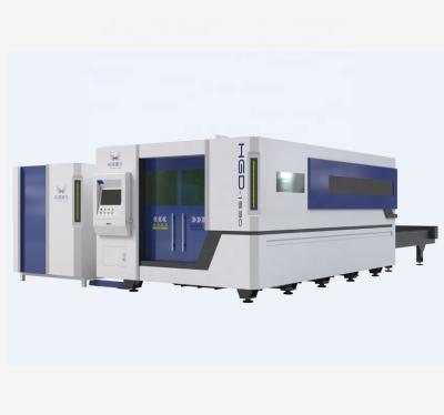 China Laser CUTTING industry cnc laser cutting machine for sheet metal cutting with full enclosure cabinet and exchange tables for sale