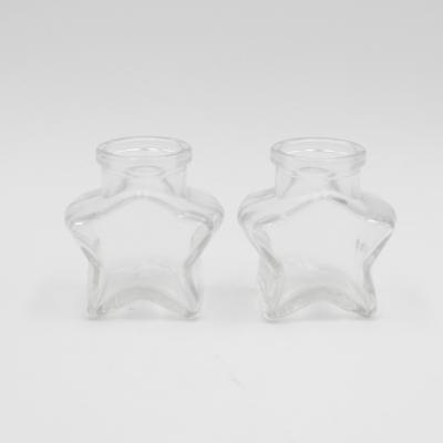 중국 Viable empty star shaped glass jar with cork mini glass jam jar glass jar for baby 판매용