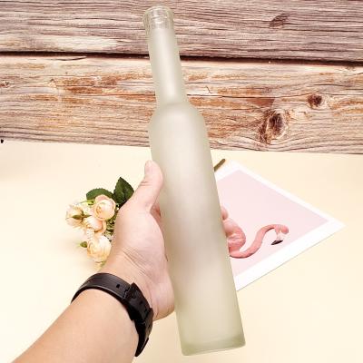 Cina 375ml Empty Cool Color Customized Glass Fruit Wine Logo Beverage Squeezer Glass Bottle Freeze Glass Bottle in vendita