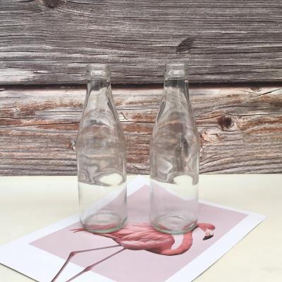 China 8oz Empty Carbonated Beverage Drinking Glass Bottle With Crown Lid Clear Glass Round Bottle For CO2 Drinks for sale