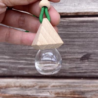 China China luxury manufacturer supplied mini round 5ml glass perfume bottle for car colorful clamp for sale for sale