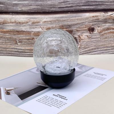 China Gift & Wholesale Decorative Craft Ice Flower Glass Ball Small Glassware With LED Light Garden Lamp Anti-Water for sale