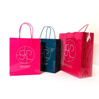 China Custom Logo Luxury Gift Paper Packaging Material Manufacturer Recycled Professional Recyclable Paper Bag for sale