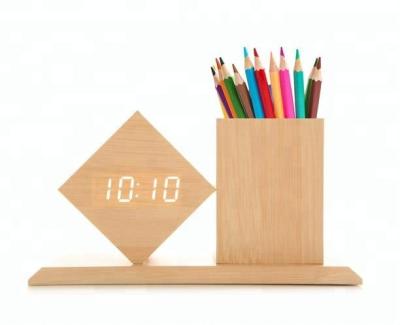 China Creative Fancy Calendars ET547 RTS Shape Alarm Led Clock With Pen Holder And Temperature for sale