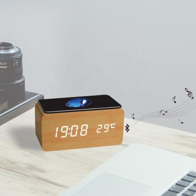 China Class 2021 Amazon Online Top Selling Wooden LED Alarm Clock Temperature Display Radio Phone Charger Desk Clock for sale