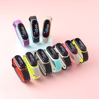 China Hot Selling Cheap Digital Day/Date Kids Led With Doll Girl Boy Led Touch Silicone Customized Watch for sale