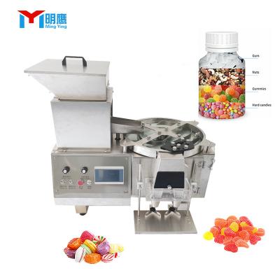 China Gummy Candy Tablet Capsule Automatic electronic counting bottling machine Soft gummy bear tablet capsule candy candy chocolate bean counting machine for sale