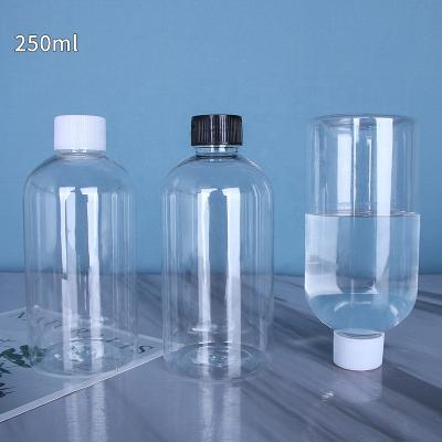 China 250ml Thickening Plastic Eco - Friendly Type Round Small Mouth Transparent Liquid Bottle With White And Black Cap for sale