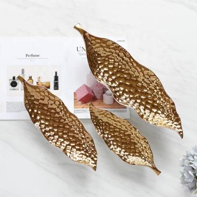 China Sustainable Factory Wholesale Leaf Electrically Shaped Ceramic Gold Plated Fruit Bowl for sale