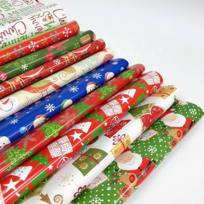 China Rustproof Factory Custom Christmas Decoration Supplies Gift Wrapping Paper Roll Wholesale Santa Design Christmas Gift Wrapping Paper for sale