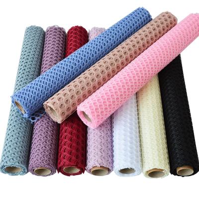 China Wholesale New Gift Fashion Flower Bouquet Wrapping Paper Mesh Material Wrapping Paper Roll for sale