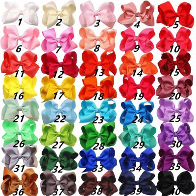 China Fashion Hot Sale Cute 4 Inch Grosgrain Solid Color Bowknot Hair Bows With Clips Price Kid Girls Handmade Cheap Hair Accessories for sale