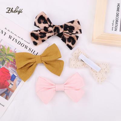 China New Children Hair Accessories Soft Floral Bow Hairpin Simple Fabric Printing Hair Clips 2369 for sale