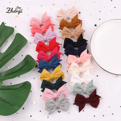 China 2022 New Style Felt Bow Hairpin Cute Soft Small Hair Clips Bangs Side Clip Headwear For Women 2291 for sale