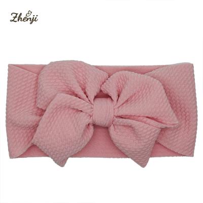 China Cute Fashion Bowknot Baby Headband Turban Solid Color Babies Waffle Elastic Newborn Hair Bands Soft Nylon Hair Accessories for sale