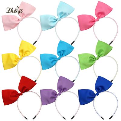 China Fashion Hair Accessories 7 Inch Big Bow Headband For Girls Solid Ribbon Headbands With Circles Kids Daily Life Plastic Headwear for sale