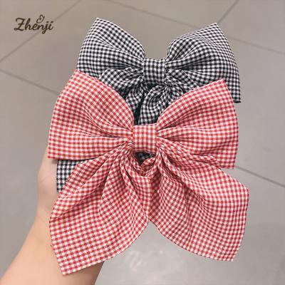 China Sweet bowknot hairpin polka dot daisy gingham style simple temperament head back spoon girl platypus clip for teenage hair accessories for sale