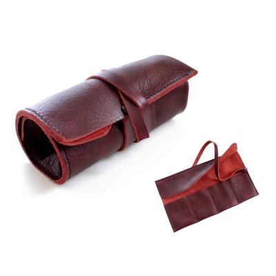 China 4 Pockets and a Leather Strap Wrapped as Genuine Leather Logo Customized Closure Watch Roll Wine Color Leather Vegetable Tan Debossed OEM for Travelers Manufacturer for sale