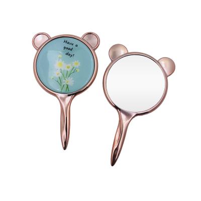 China Personalized flower pattern cartoon shape can be customized plastic round beautiful small hand-held makeup mirror for sale