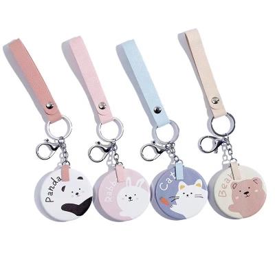 China Wholesale Cute PU Leather Cosmetic Mirror Factory Pattern Magnifying Pocket Head Chained Portable Mirror For Gift for sale