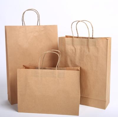 China 2021 kraft paper brown white paper bag for shopping red wine packaging clothing gift bag in stock for sale