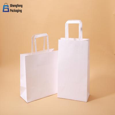 China Printed foldable white kraft paper portable paper bag with manufacturer logo for sale