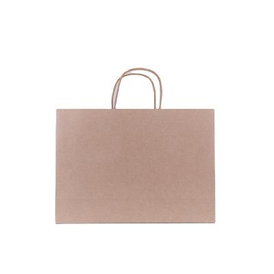 China Wholesale Custom Logo Printed Grocery Packaging Craft Brown Kraft Paper Shopping Bag With Handle for sale