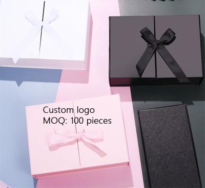 China Beautiful and useful black double door paper box cosmetics rectangle festival packaging luxury gift box reasonable price for sale