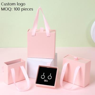 China Eco-friendly Customized Small Logo Jewelry Paper Cardboard Suitcase Box With Handle for sale