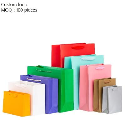 China Recycled White Kraft Paper Bag Kraft Paper Bag Custom Printing Logo Various Styles Materials In-stock Direct Sales for sale