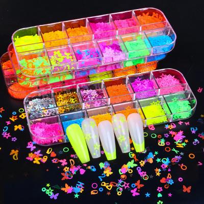 China Finger Nail Art Beauty IMAGNAIL New 12 Grids Letters Flowers Star Heart Butterfly Shaped Fluorescent Nail Glitter Sequins For Nail Art DIY for sale