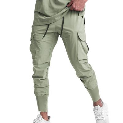 China Wholesale Pocket Waterproof Quick Dry Breathable Anti-pilling Multi Sports Jogging Pants Mens Workwear Solid Color Mens Training Pants for sale