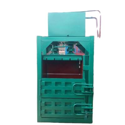 China hydraulic used clothes and textile compress hay and straw baler machine for sale