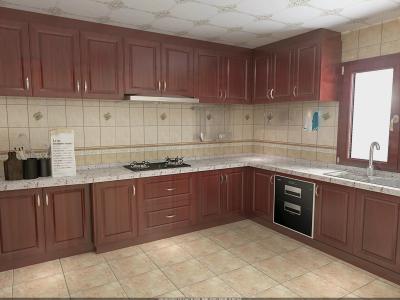 China Wooden Grain Cherry Wood Pvc Villa Kitchen Cabinets Traditional L - Shape For Home for sale