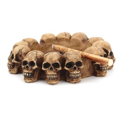 China Cross Ashtray Home Decor Skull Resin Vintage Decoration Skull Cross Ashtray Customized LOGO Resin Crafts Skull Head Ashtray Wholesale for sale