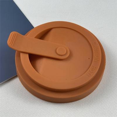 China Non Spill Soft Silicone Cup Cover 8cm Stretchable Coffee Bottle Lid With Silicone Handle for sale