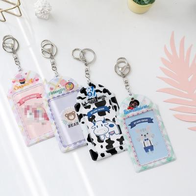 China Fashion 10 Pocket Designs 2 Personalized Photocard Holder Key Chain Small Holographic Photo Sleeve Key Chain Photo Frame for sale