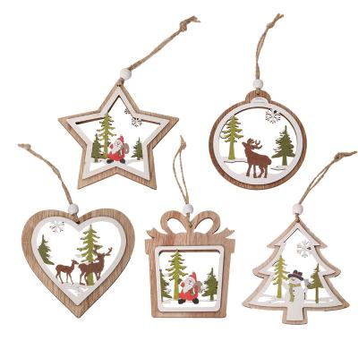 China New Heart Christmas Decorations Christmas Decor Round Christmas Star Wooden Tree Hollow Hanging Props for sale