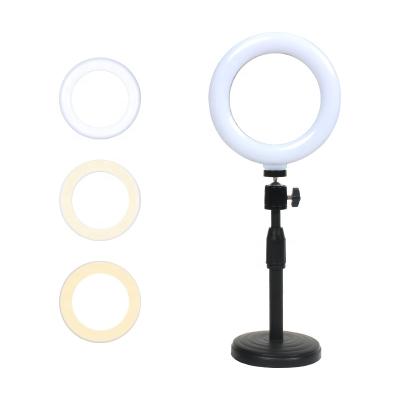 China Factory Wholesale Adjustable Tempurate Color Portable Dimmer Rotating Ring Fill Lights Foldable Thumb Selfie Light for sale