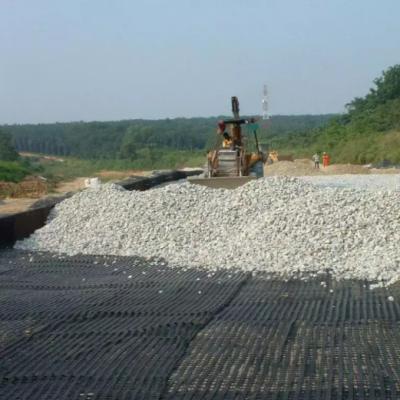 China Biaxial 180-180 KN PET Road Geogrid Black Polyester Geogrid Slope Protection and Construction Geosynthetics for sale