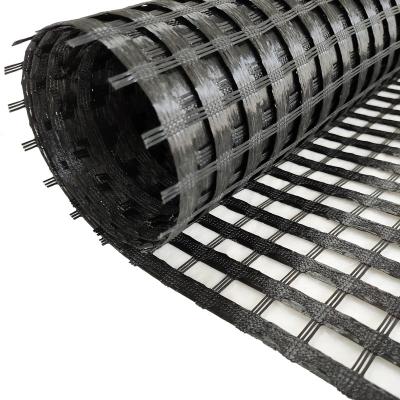 China Industrial Civil Engineering Bitumen Reinforcing Fiberglass Geogrid 150-30kN for sale