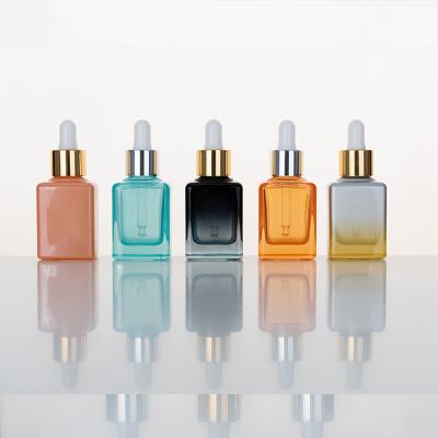 China Frosted Glass 30ml Cosmetics Blue 15ml Perfume Dropper Essential Oil Bottle for sale