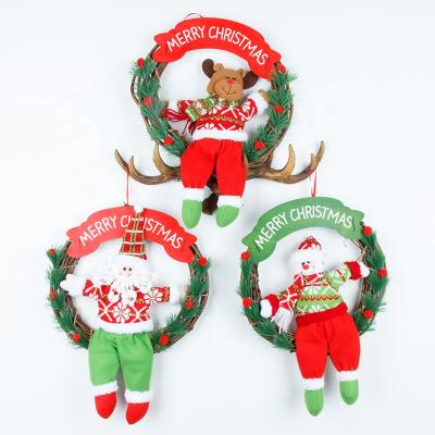 China Eco-Friendly Santa Claus Snowman Dolls Deer Wreath Wreath Front Door Rattan Natural Christmas Wreath for sale