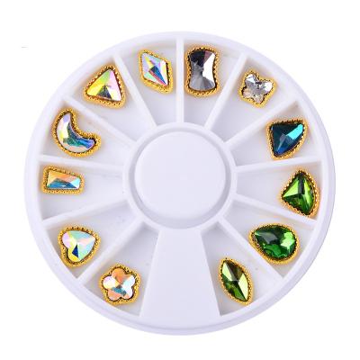 China Fashion Rhinestone Wheel Art Metal Nail Jewelry Accessories Decorations Mix Designs 12Pcs 3D Laser ab Color Glitter Charm Alloy Nail for sale