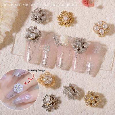 China Fashion and Charm Gold/Silver Rotating Jewelery Crystal Rhinestones Luxury 3D Zircon Snowflowers Nail Beads Snowflakes Nail Art Decorations for sale